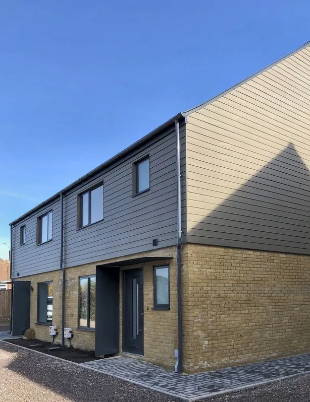 New homes in buff brick and dark weatherboarding, Kings Worthy